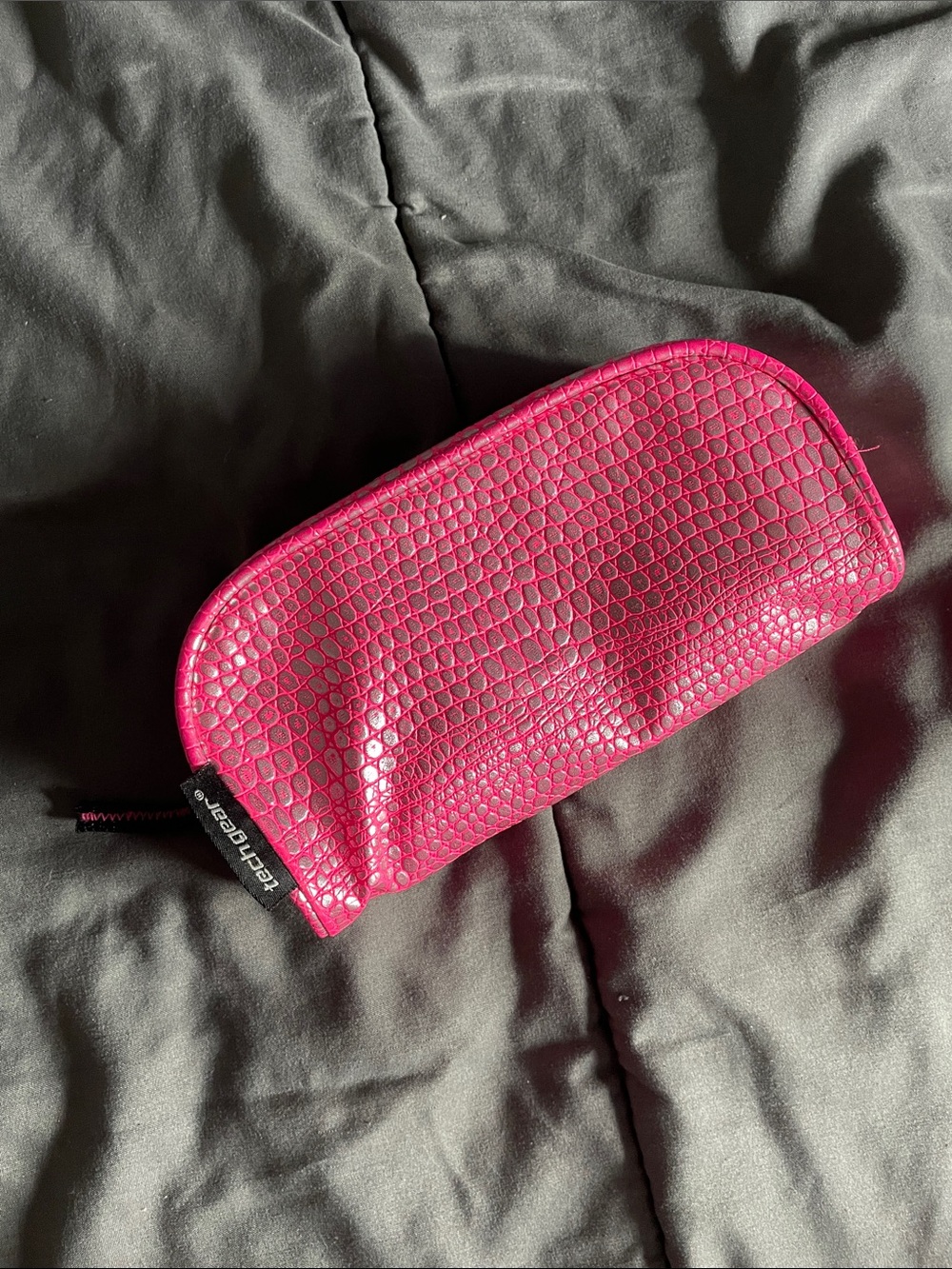 Pink gator-print zip bag